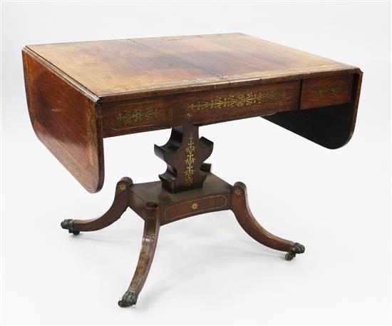 An early 19th century rosewood and cut brass inlaid sofa table, W.5ft